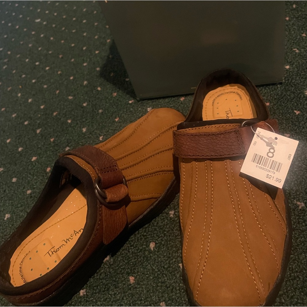 Slip on shoes. Size 8. Brand new. Never worn. Leather.